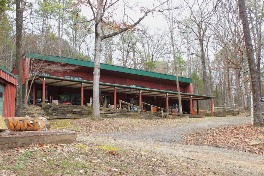 Rare Find, 12.48 acres inside city limits of Heber Springs. Have you longed to be in the woods but didn't want to give up the pleasures of living in town, this is your opportunity.  Tucked away at the end of Spring Heights Dr. you will find this spacious 3 bed 2 bath surrounded by nature. Tile through most of the house, walk in closets, and large windows to allow natural lighting. Minutes to Greers Ferry lake and plenty of room for the toys.  Great covered patio for entertaining or to just sit back relax and enjoy the view.  Abundance of wildlife and a great place for in-town hunt. Properties like this don't come along often.