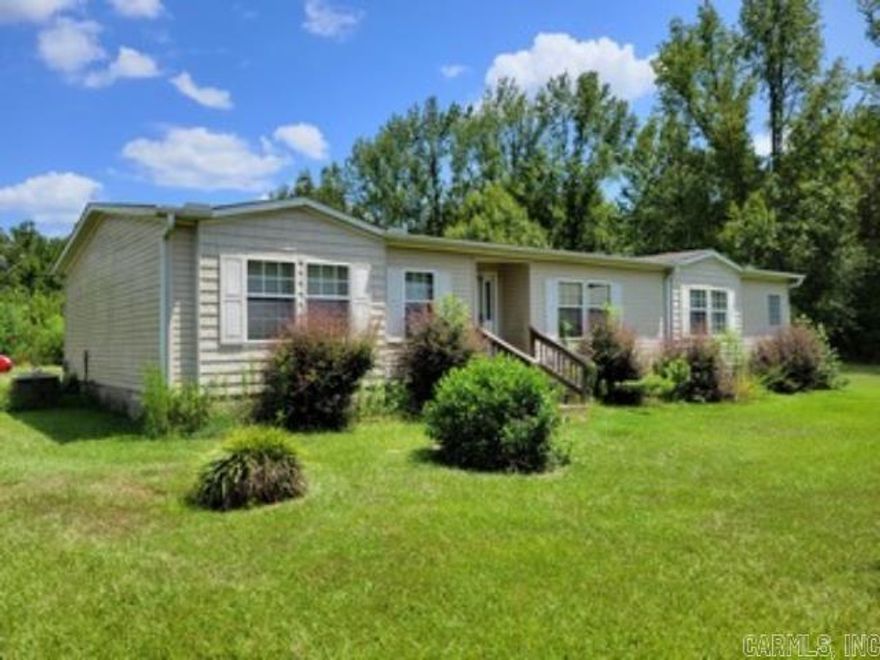 Mobile home on 3 acres.