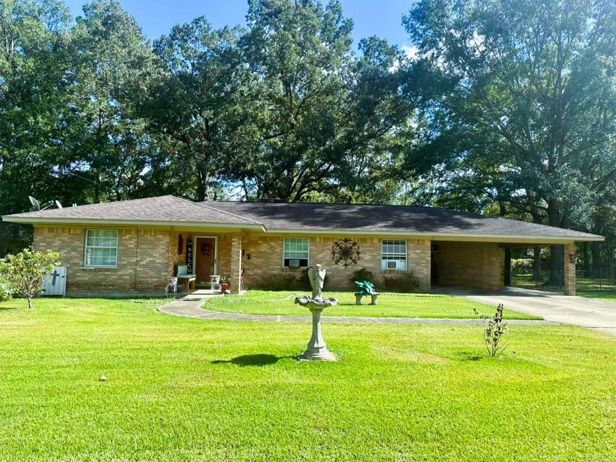 Home located in a great neighborhood.  This property features 3 bedrooms and 2 bathrooms, open floor plan with living room and dining room combo.  Galley style kitchen with eat in area.  Tile counter tops with a bar and desk area.  All three bedrooms are nice size with a double closet in primary.  Hall bathroom has a "walk- in" tub.  The whole house has new LVT flooring throughout.  Covered back patio, fenced in backyard along with a shop.