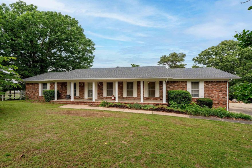 Beautifully updated brick home offering a light, open layout in a fantastic Heber Springs location! Recent renovations include walls removed to create an inviting open floor plan, new luxury vinyl flooring, quartz countertops, fresh paint throughout, new water heater, 98% efficient HVAC, new roof, and many more. The spacious living area features a cozy fireplace and flows seamlessly into the kitchen with an eat-in bar perfect for gathering with family and friends. The sunroom has been additionally heated and cooled, adding valuable extra living space to enjoy year round. A heated and cooled office space in the garage is perfect for working from home, hobbies, or a flex space. Below the home is a basement that is perfect for Arkansas storms and additional storage. Outside, you'll love the charming front porch along with two back decks overlooking the backyard, creating great spaces to relax and entertain. This well-maintained home offers a wonderful combination of updates, functionality, and charm! Tour today!!!