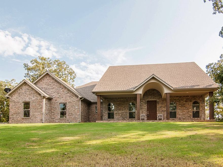 County home will fantastic views, cul-de-sac, gated community. This home has open floor plan, tall ceilings, and nice crown molding. Upstairs has almost 1000 sq ft of bonus room that can be used for additional bedrooms, theater, or man cave.  Enjoy you morning coffee on the large covered from porch with 12" Cyprus columns or the back porch with vista and mountain views. See agent comments.