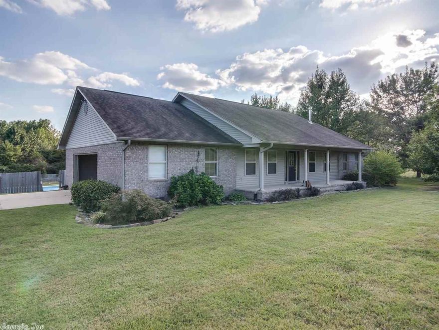Great country home without being too far from the city. On almost two acres, this home features an in ground swimming pool, a large shop, new paint, new flooring, and much more. This home is a must see!