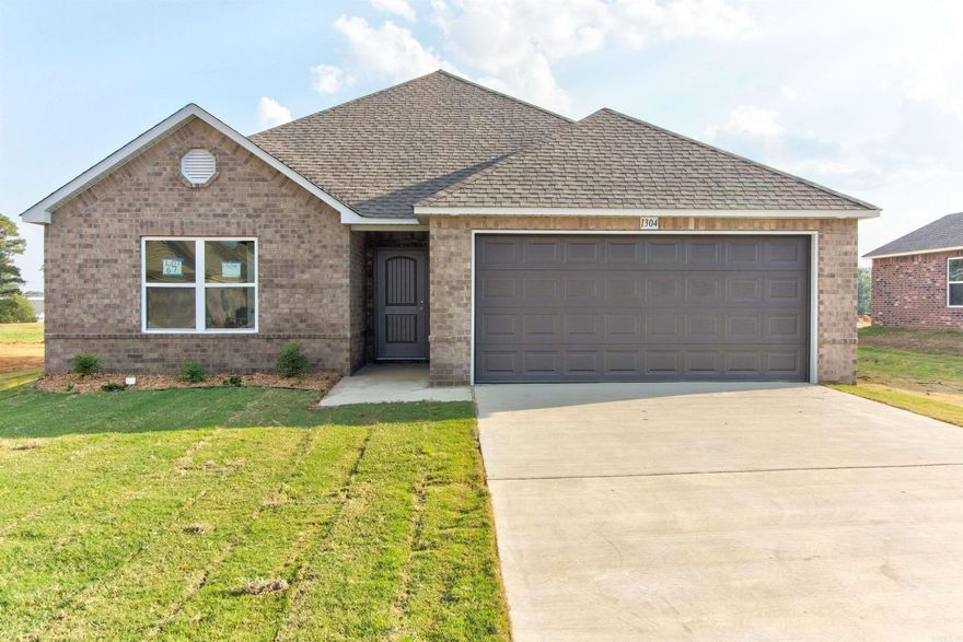 The brand new Fenway plan! A bright, airy 3-bedroom open concept, this plan boasts a lovely covered back patio. Architectural shingles, luxury vinyl plank in wet areas, and LED disk lighting upgrade in kitchen, stainless steel appliance pack. This home site has a long, very gently sloped driveway.  Upgrades included in this home: garage door opener, 8/12 roof with architectural shingles, plumbing faucet upgrade 2, 8" deep Kitchen sink, 50 gallon water heater, added cable jack, HVAC rigid duct upgrade, flush bar top laminate, Luxury Vinyl Plank in wet areas, Cheyenne style interior doors, attic stairs, LED disk lights in Kitchen and Master Bath, stainless steel appliance package.   THIS HOME IS SCHEDULED TO BE COMPLETE IN LATE SEPTEMBER.