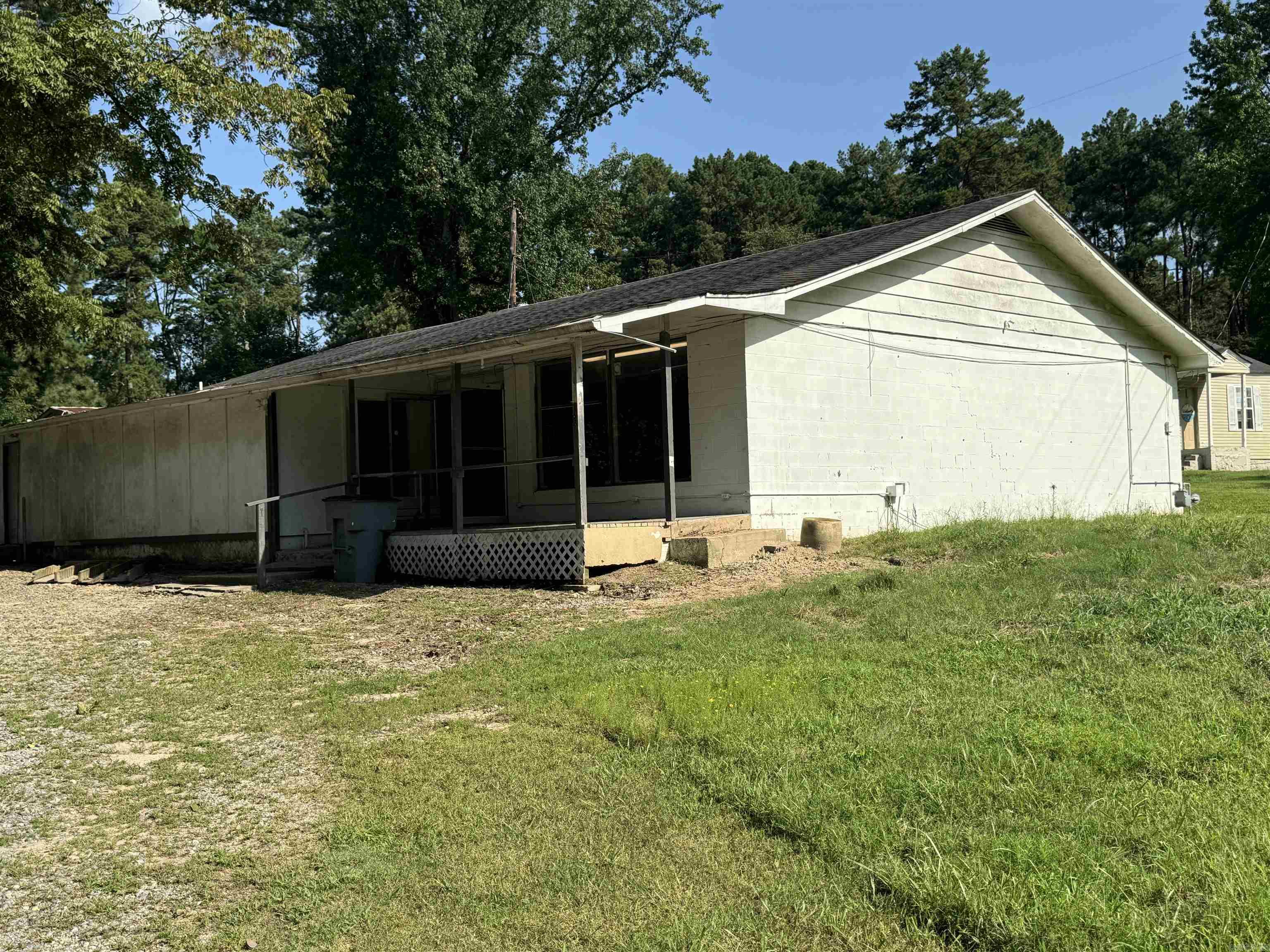 2400 sf building has been used for various businesses. Most recently it was used as a daycare. It has one large open area in the front, 3 restrooms (one with multiple toilets), an area for a kitchen, and two large rooms in the back. Come and build it out how you need it.