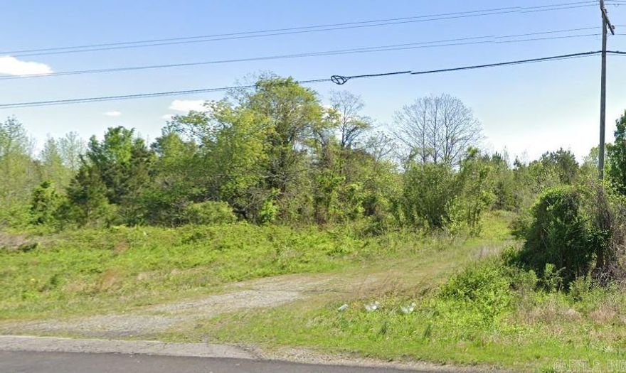 14.53 acres with excellent potential just off AR Hwy 15N at the Remington Rd exit. Convenient location near main road and highway access. Ideal for building a private estate or developing a residential subdivision. Utilities nearby. Great investment opportunity in a growing area!