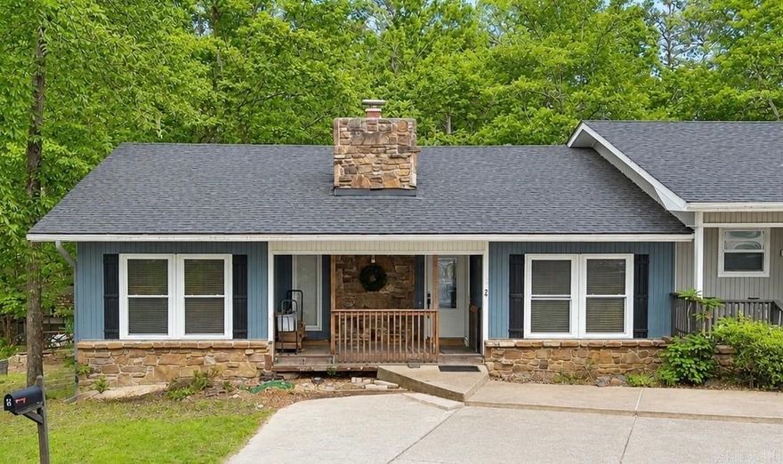 Lakefront living meets investment opportunity on beautiful Lake DeSoto! This fully furnished (minus a few personal items), 4-bedroom, 3-bath end-unit townhouse offers 2,276 sq. ft. of completely remodeled space designed for comfort, style, and relaxation. Professionally redesigned with high-end finishes throughout, this property is move-in or rental ready. Enjoy stunning lakefront views from the newer upper deck or lower patio, both perfectly positioned for entertaining or unwinding by the water. Upstairs, you'll find a split floor plan with 3 bedrooms, 2 full baths and a beautifully remodeled kitchen featuring quartz countertops, tile backsplash and new appliances. With an open floor plan design, you are sure to appreciate the new easy-to-clean LVP flooring, wood burning fireplace and extra storage throughout. The lower level includes a second living space, perfect for hosting as it comes equipped with a kitchenette, ping pong table, extra-large bedroom, full bathroom, new windows, and new sliding glass doors leading to the lakeside patio. Whether you’re searching for an Airbnb investment, vacation retreat or full-time residence, this property checks every box.