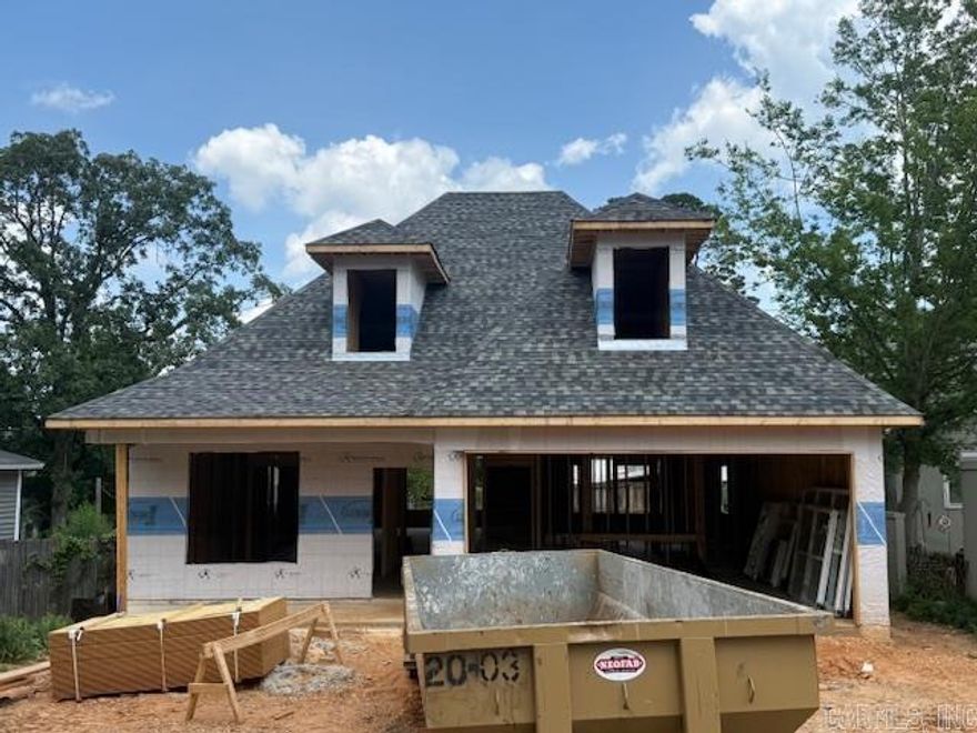 New construction in the heart of Cammack Village—built by a highly respected custom builder with decades of experience! Estimated completion Dec. 2025. Exterior features a striking mix of rock with cedar accents and durable Hardie Board siding. Inside, enjoy a no-carpet design and a functional layout on a level lot. The main level offers the spacious primary suite, 1.5 baths, and a room perfect for a formal dining space or office. The chef’s kitchen offers custom cabinetry, quartz slab countertops, and a large island. Upstairs includes 3 bedrooms, a full bath with double sinks, and a game/media room. Step outside to a covered patio overlooking a level backyard—perfect for gatherings or quiet evenings. Quality, style, and comfort in a desirable location make this one a must-see!