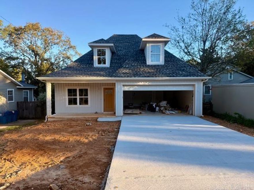 New construction in the heart of Cammack Village—built by a highly respected custom builder with decades of experience! Estimated completion Dec. 2025. Exterior features a striking mix of rock with cedar accents and durable Hardie Board siding. Inside, enjoy a no-carpet design and a functional layout on a level lot. The main level offers the spacious primary suite, 1.5 baths, and a room perfect for a formal dining space or office. The chef’s kitchen offers custom cabinetry, quartz slab countertops, and a large island. Upstairs includes 3 bedrooms, a full bath with double sinks, and a game/media room. Step outside to a covered patio overlooking a level backyard—perfect for gatherings or quiet evenings. Quality, style, and comfort in a desirable location make this one a must-see!