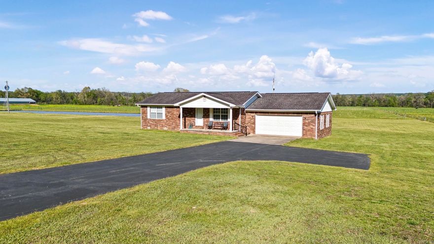 COMPLETELY REMODELD AND UPDATED. throughout. New flooring, fixtures, paint, & vanities, enjoy the updated kitchen with new countertops and appliances. Enjoy the back deck that is accessible from the primary bedroom & kitchen. The 2-car garage is oversized. All of this sets on 38 AC M/L. There is a huge pond that is well stocked, the barn is one that makes people want a barn even if they don't need it! The shop is massive with 2 bays and the lean to is set up for huge air compressor, if that wasn't enough there is another enclosed garage area, the land is pristine perfect and ready for livestock, fenced and cross fenced! Yet it doesn't stop there, how would you like to own part of a creek? Point Remove creek to be precise. Don't let this one get away! SEE PRIVATE REMA