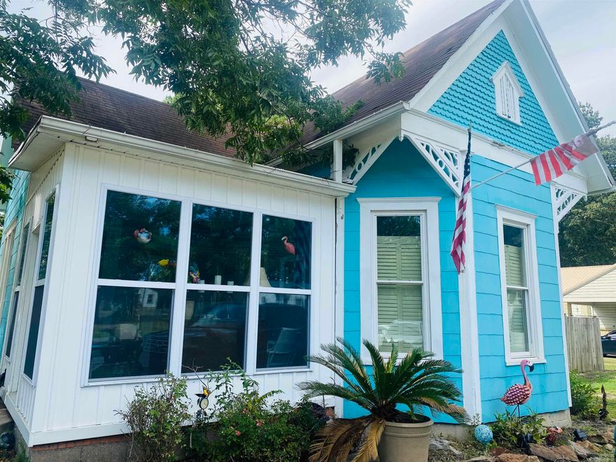 This charming and truly unique 2-bedroom, 2-bathroom home is full of warmth, character, and all the extras that make a house feel like home. From the moment you see the bold blue exterior, you’ll know this property is something special. Step inside to discover a cozy kitchen perfect for slow mornings and homemade meals, large laundry area, spacious living area, and more. With a little TLC, this one could be everything you’ve dreamed about! Outside, the space really shines — enjoy a large, fully fenced backyard, an above-ground pool for summer fun, a screened-in area ideal for morning coffee or late-night chats, and multiple storage buildings for all your tools, hobbies, and extras. A unique property with heart, ready for its next chapter! Come see for yourself!  Agents See Remarks.