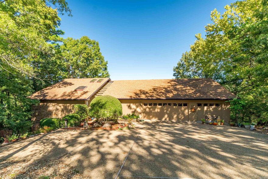 Beautiful Lake Balboa Home with Expansive Views! Enjoy lake living at its finest in this well-maintained one- level home offering exceptional water views and a comfortable, split-bedroom floor plan. The spacious great room features a wood-burning fireplace (convertible to propane if desired) and flows easily to the large lakeside deck—perfect for relaxing or entertaining while taking in the scenery.  The primary suite offers a generous bath with separate tub and shower, plus his-and-hers closets for ample storage. Additional highlights include a long gentle driveway with turn-around, and a three-car garage, the front entry is charming with it's covered front atrium ideal for plants or a quiet seating area.  Located on a large point lot (.86 acre) with 214 feet of Lake Balboa frontage, the property qualifies for a private dock if desired. Roof was replaced in 2017 for peace of mind. Lower level has abundance of dry concrete floor storage.   Great for workshop or yard tools.    Don’t miss this opportunity to own a home with outstanding views on the Village’s premier lake—come see it today!  Fyi: Most home furnishings available for purchase.   SEE AGENT REMARKS