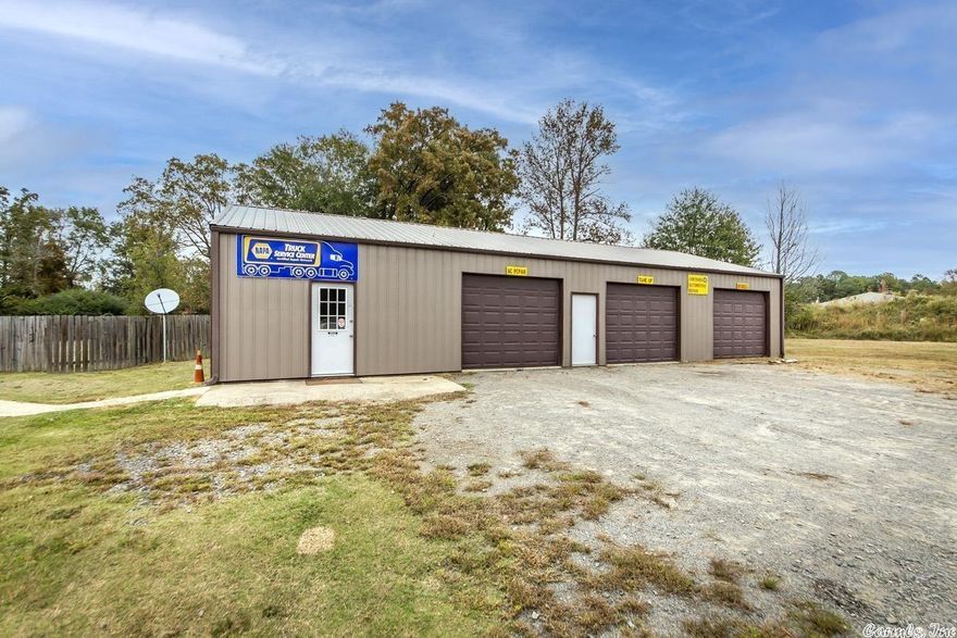 Great investment opportunity!  This 30x60 three bay shop with office space will fit your business needs. This shop has central heat and air, a restroom, breakroom, and a lobby area. The third bay of the shop has a drain system in place.  Included with the shop is a 3bedroom 1bath home. The home has a new water heater, new dishwasher, metal roof, an additional 16x30 shop, storm shelter, and a barn within the fenced back yard.  All if this sits on 2.43 acres and is zoned C-2.