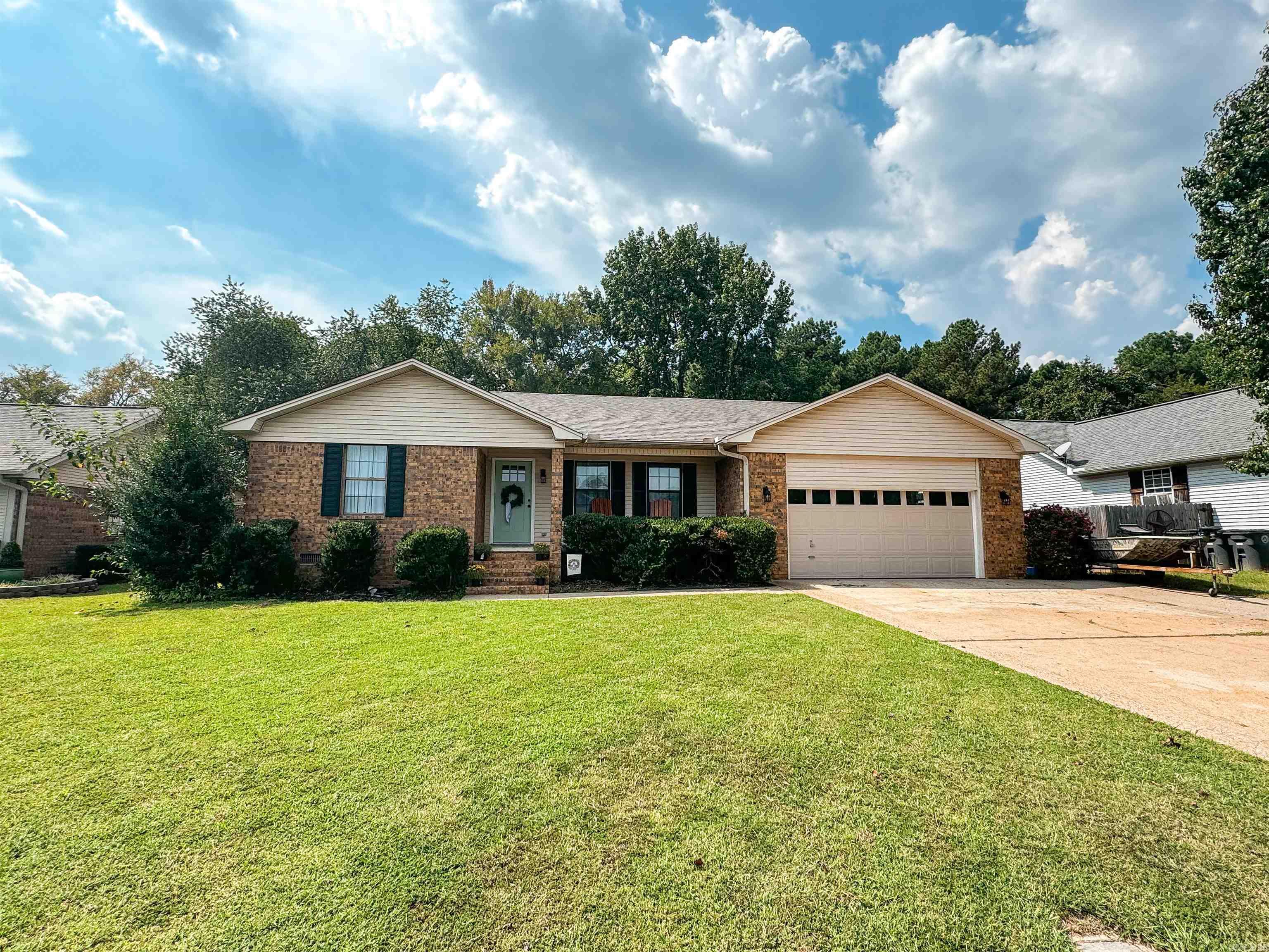 Lovely 3 Bedroom/2 full baths with half bath off laundry room. This home has had some amazing updates including a total kitchen remodel, countertops, laminate flooring, paint, some windows, newer oven, microwave, toilets, ceiling fans & more. There is a spacious sunroom that runs along the back of the house that can be used as a second living area, office or playroom. The living room is very roomy with vaulted ceilings and extra lighting. Roof was replaced 7/24 & HVAC is newer as well. Other features include a 2 car garage, quartz countertops, pantry & breakfast bar, patio & fenced backyard. Call today to get a tour of this beautiful home! Agents see remarks.