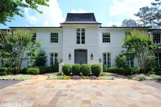 This exquisite gem is nestled in 1.48 acres in a prestigious WLR gated community.  It is a private oasis surrounded by woods featuring a guesthouse, swimming pool, goldfish pond and manicured gardens.  The house is pristine with every amenity you can imagine for comfort and graceful living. Guesthouse 1,209 sf. with 2 bedrooms and 1 bath. See agent remarks