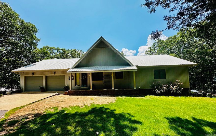 Beautiful home in a quiet neighborhood!!! Winter lake view! just minutes from Devils Fork. This home features an eat in kitchen with a separate formal dining room with built ins. This home has room for everyone and all the lake toys! It has an extra room that could be used as an office or extra bedroom. The fully finished walk out basement to access the lower deck. The home features two shop, one is 22x28 and the other is 24x37. Woodburning fireplace downstairs!! Working well!  Call today! This is a MUST see!