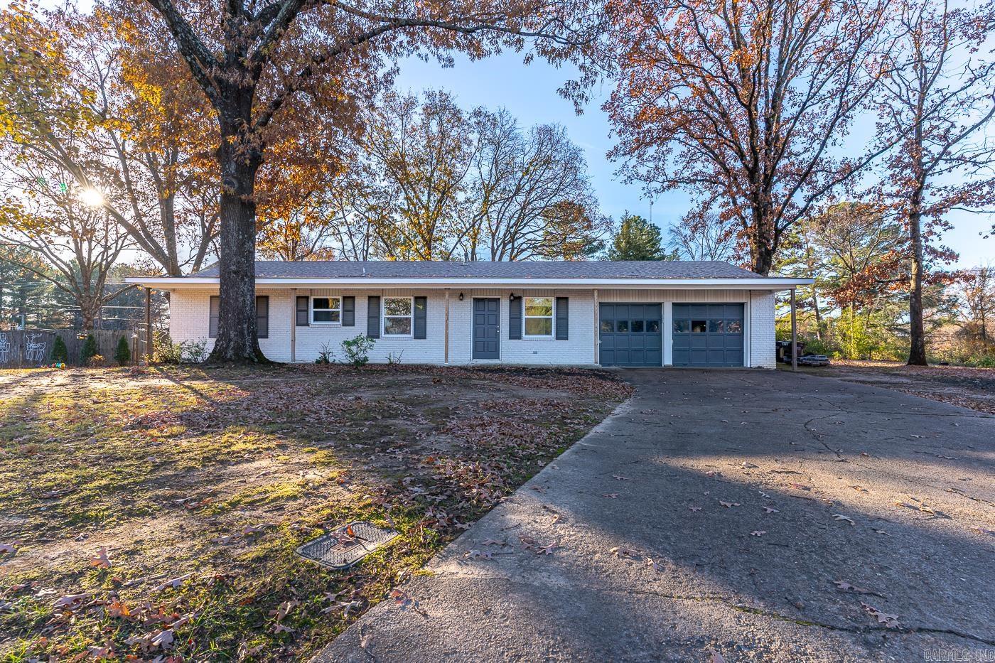 Welcome to 204 Karen Ct. This 4-bedroom, 2-bathroom brick home is located near A-State and minutes from restaurants & shops. Situated in a quiet cul-de-sac, it features a two-car garage, a spacious backyard, and a cozy campfire area.  The kitchen includes granite countertops, stainless steel appliances, a built-in microwave, refrigerator, stove, and dishwasher. There is a large walk-in pantry and a separate laundry area.  Updates in 2024 include all new windows throughout and a Class 3 architectural shingle roof.  The primary bathroom has a double vanity and tub, while the second bathroom includes a walk in shower. Located in the Nettleton School District and just off Aggie Rd, this home offers lots of convenience. Call your favorite agent to show today!