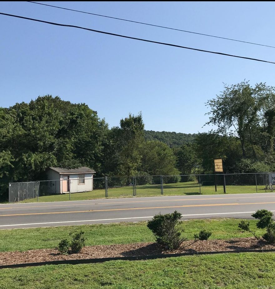 This Commercial lot, .928 acres, is located at a busy intersection with high traffic volume, offers immense potential for business success. The increased visibility and accessibility make it an attractive prospect for various enterprises, enduring a constant stream of potential customers passing by. Whether you are looking to establish a retail store, restaurant or office space this prime location is bound to attract attention.