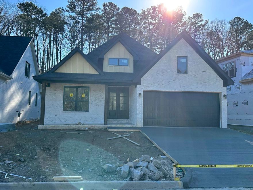 This Stunning 3 bedroom 2 bath home, located in Kinley Ridge, one of Chenal's Newest Subdivisions, is a Must See! This Open Floor Plan includes a gourmet kitchen with an oversized island, quartz countertops, gas range, microwave drawer, and dishwasher and offers all the lighting you'll need with pendants over the island and plenty of recess cans. Kitchen is open to the dining area and great room while enjoying the beautiful vaulted ceiling, stained beam, and fix glass windows. Enjoy a spacious master bedroom with trey ceiling, a custom tile shower and large walk-in closet with built-ins in the master bath. Other features include, Luxury Vinyl Plank throughout with tile floors in both baths, covered front and rear porches with custom wood ceilings, and a 2 car garage. Kinley Ridge is convenient to shopping and Fine Dining in WLR. Schedule your appointment today!