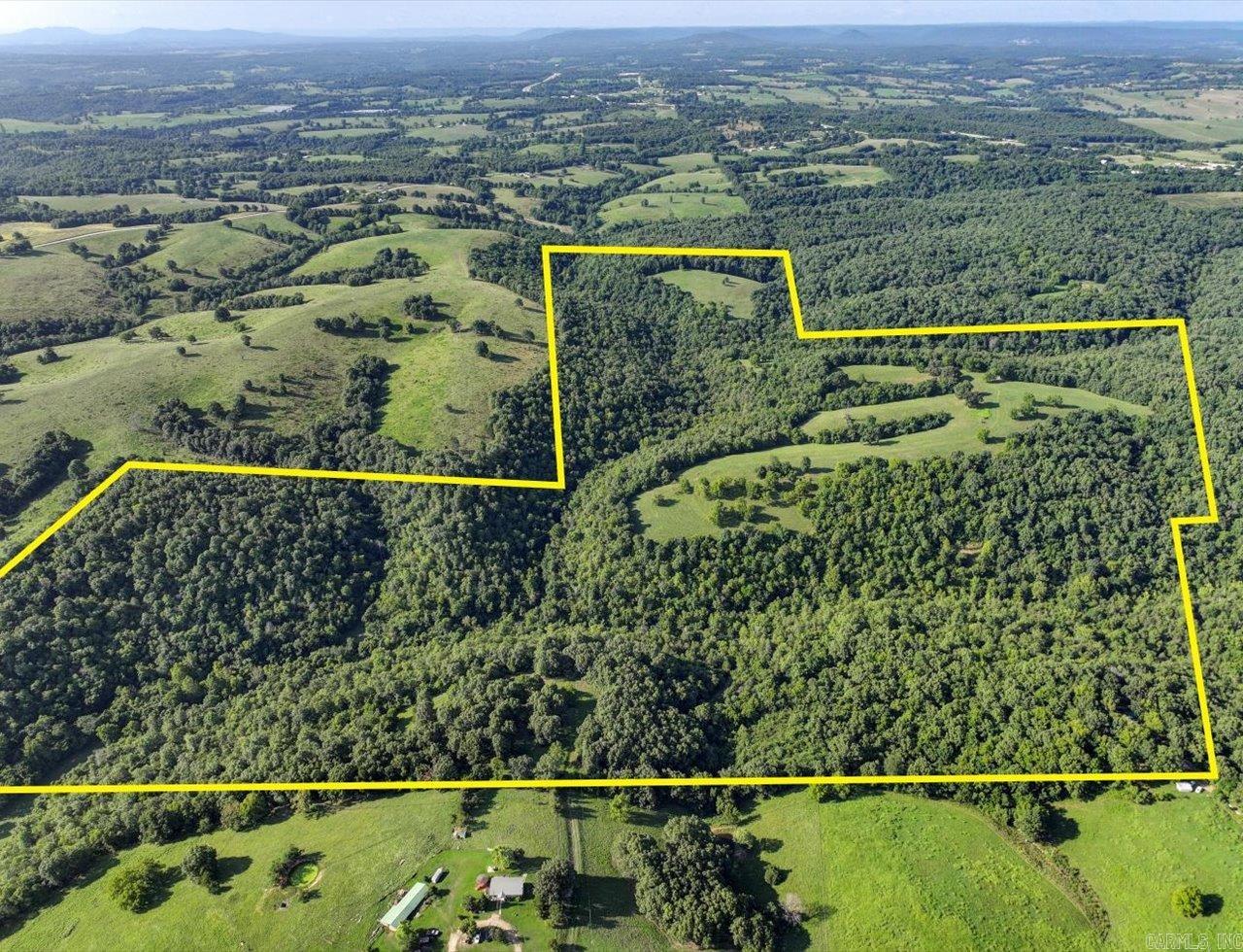 This beautiful 200-acre property in Omaha, Arkansas, located at 11381 Estes Lane, features a stunning waterfall that flows into a clear creek, offering a peaceful, natural retreat. With a small, established farm, the land is ideal for agricultural ventures or a serene escape into nature. The combination of lush landscapes and open farmland makes this property a unique and tranquil slice of Northern Arkansas. Small home currently being leased on the property with long term tenant.
