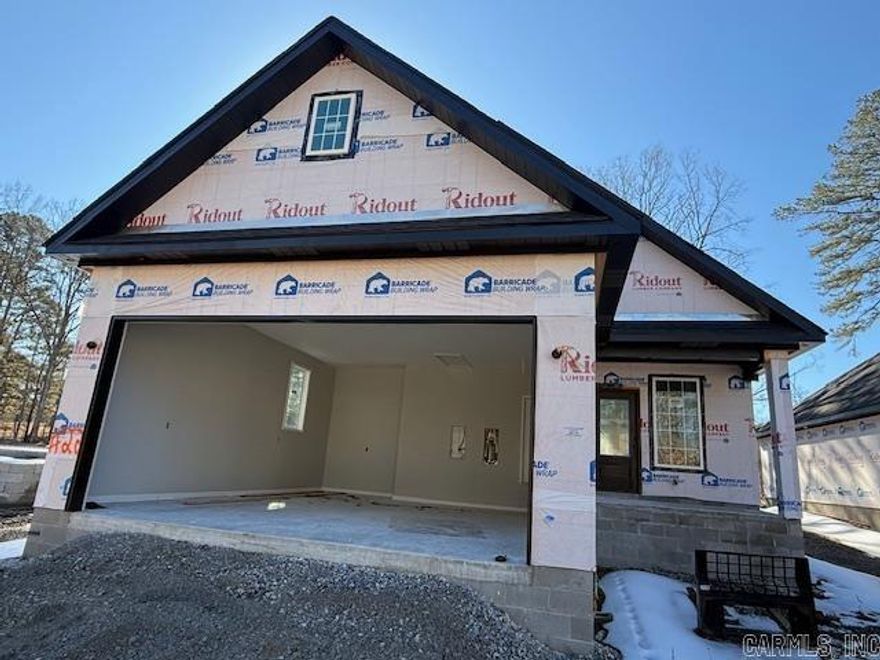 FIVE STAR rating in this 3-bedroom, 2-bath NEW CONSTRUCTION home with 1450 sq ft and quality finishes! Little Red River access and a COMMUNITY BOAT DOCK are just a few of the perks in ownership at Boulder Run! Open floor plan concept, LVP flooring, stainless appliances, quartz counters in your NEW kitchen as well as a fireplace make coming EASY and INVITING! Looking for a getaway without having to go far away? Greers Ferry Lake is just minutes away, enjoy both the RIVER and the LAKE! Call today for more details about this ADORABLE NEW HOME!