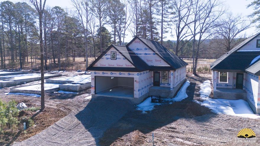 FIVE STAR rating in this 3-bedroom, 2-bath NEW CONSTRUCTION home with 1450 sq ft and quality finishes! Little Red River access and a COMMUNITY BOAT DOCK are just a few of the perks in ownership at Boulder Run! Open floor plan concept, LVP flooring, stainless appliances, quartz counters in your NEW kitchen as well as a fireplace make coming EASY and INVITING! Looking for a getaway without having to go far away? Greers Ferry Lake is just minutes away, enjoy both the RIVER and the LAKE! Call today for more details about this ADORABLE NEW HOME!