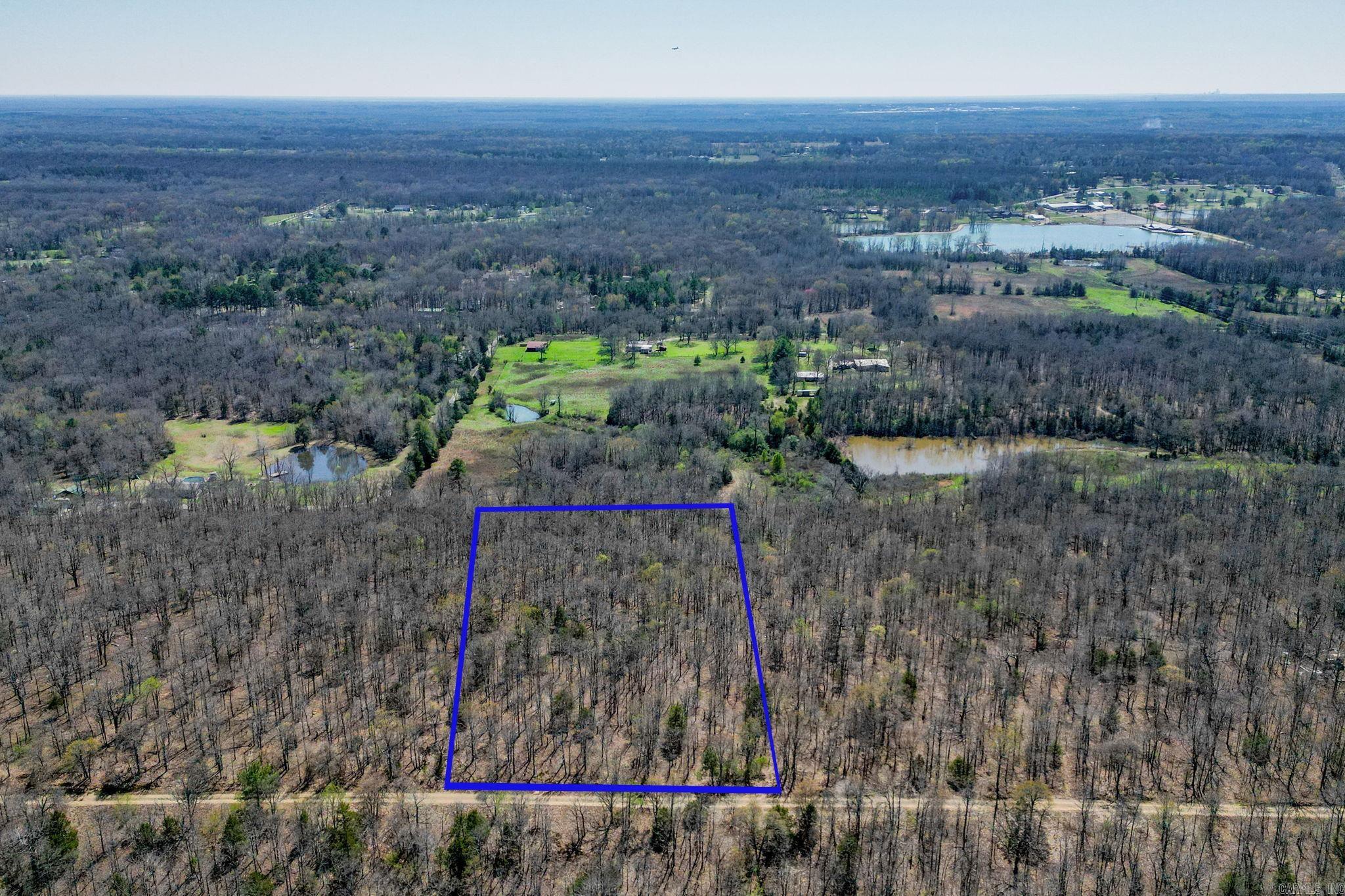 Whether you envision a sprawling estate, a cozy cabin retreat, or a sustainable homestead, this land provides endless possibilities for customization and development. This land has already had a soil pit sampled on Feb. 23, 2024 for a 4 bedroom home, and the soil was determined suitable for individual on site- wastewater disposal for a septic system. Agents: Please see attached survey. There are NO restrictions on this land!! This land is currently not on county water, so it will require buyer to establish a well. Owner financing is an option.