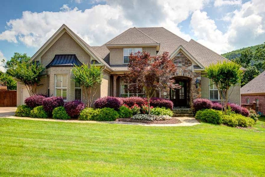 Amazing custom built home in the Courts!! A gourmet kitchen opens to the living room with maple cabinets, granite, and SS appliances. Lots of attention to detail in this home including wood beams,wood ceiling,pottery barn light fixtures, and an amazing outdoor kitchen! Downstairs includes the luxurious master suite, office,and a guest room w/bath. Upstairs has 3 bedrooms with a jack and jill bath. One room could be a bonus. Tons of floored attic and an oversized 2 car garage with built in storage. Come see!