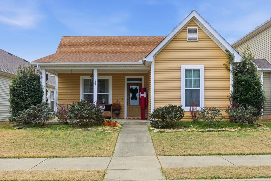 Welcome to this charming cottage-style, single-level home in a gated community. This three-bedroom, two-bath gem is filled with natural light and has a welcoming open floor plan perfect for modern living. You’ll love relaxing by the cozy fireplace, enjoying the inviting front porch, and taking advantage of the convenient back entry.  The primary suite features a walk-in closet and double vanities for a touch of luxury. Plus, the home comes with a brand new roof added in 2023, giving you extra peace of mind. With a two-car garage and a super convenient location, this home is full of charm and ready to welcome you. Come see it and fall in love!