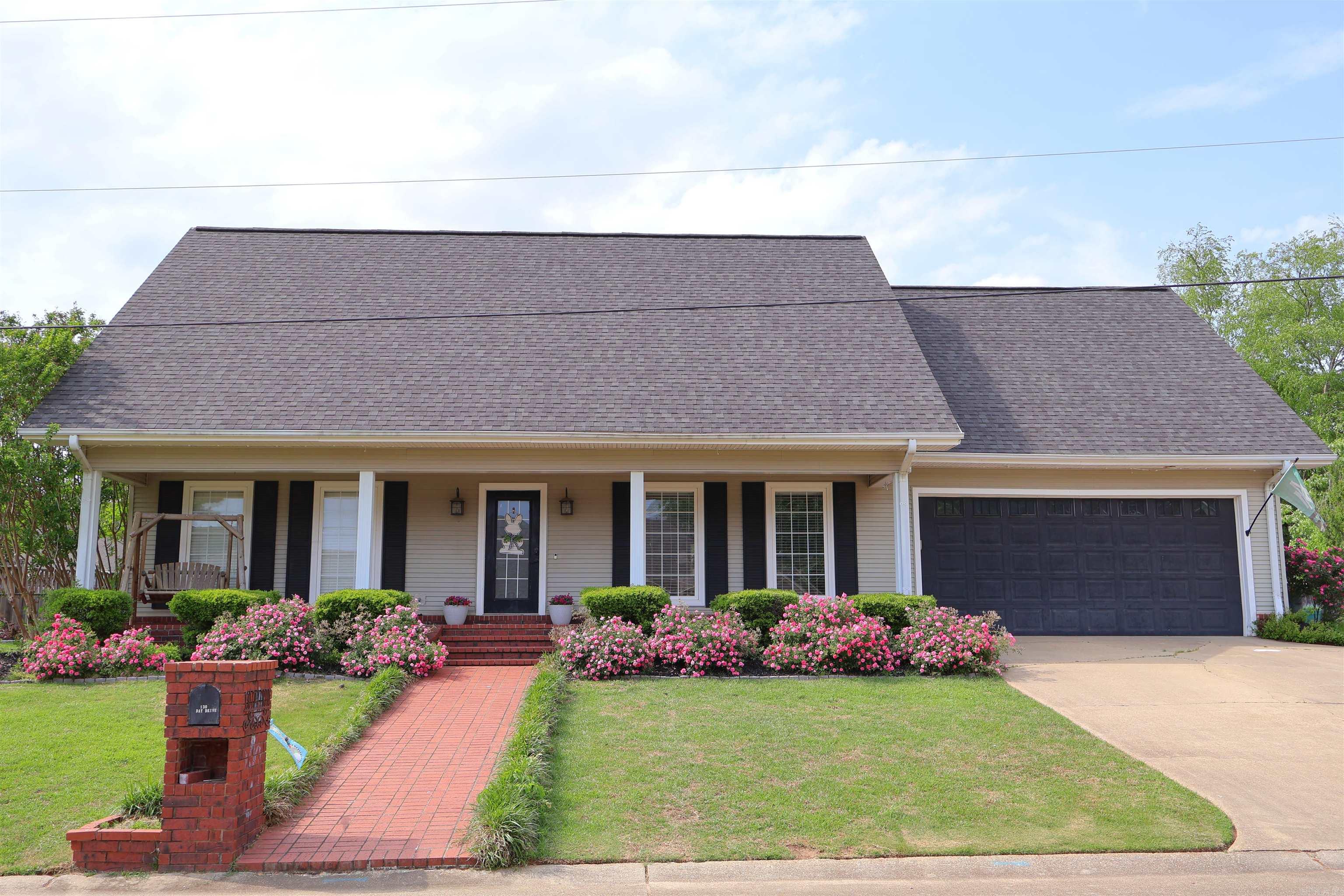 Tucked away on a quiet, no-thru-traffic street, 130 Day Drive offers the perfect blend of space, comfort, and convenience. With 4 bedrooms, 2.5 bathrooms, and 3,060 sq. ft., this home is designed for easy living. The main level features a welcoming living room with a cozy fireplace, a well-equipped kitchen with an island and coffee bar, and a large laundry room with an attached office. The primary suite is also on the first floor, providing a comfortable and convenient space. Upstairs, you’ll find two oversized bedrooms with spacious closets, along with a large playroom—complete with its own generous closet—that could easily serve as a fourth bedroom. Recent upgrades include the installation of two new HVAC units, ensuring year-round comfort and efficiency. Outside, enjoy a covered patio, fenced backyard, and a two-car garage—plus a small back garage perfect for outdoor or motor equipment. Situated next to Monticello Country Club, this home provides easy access to a golf cart path that leads directly to the course, all while being just minutes from shopping, dining, and local amenities. Schedule your showing today!