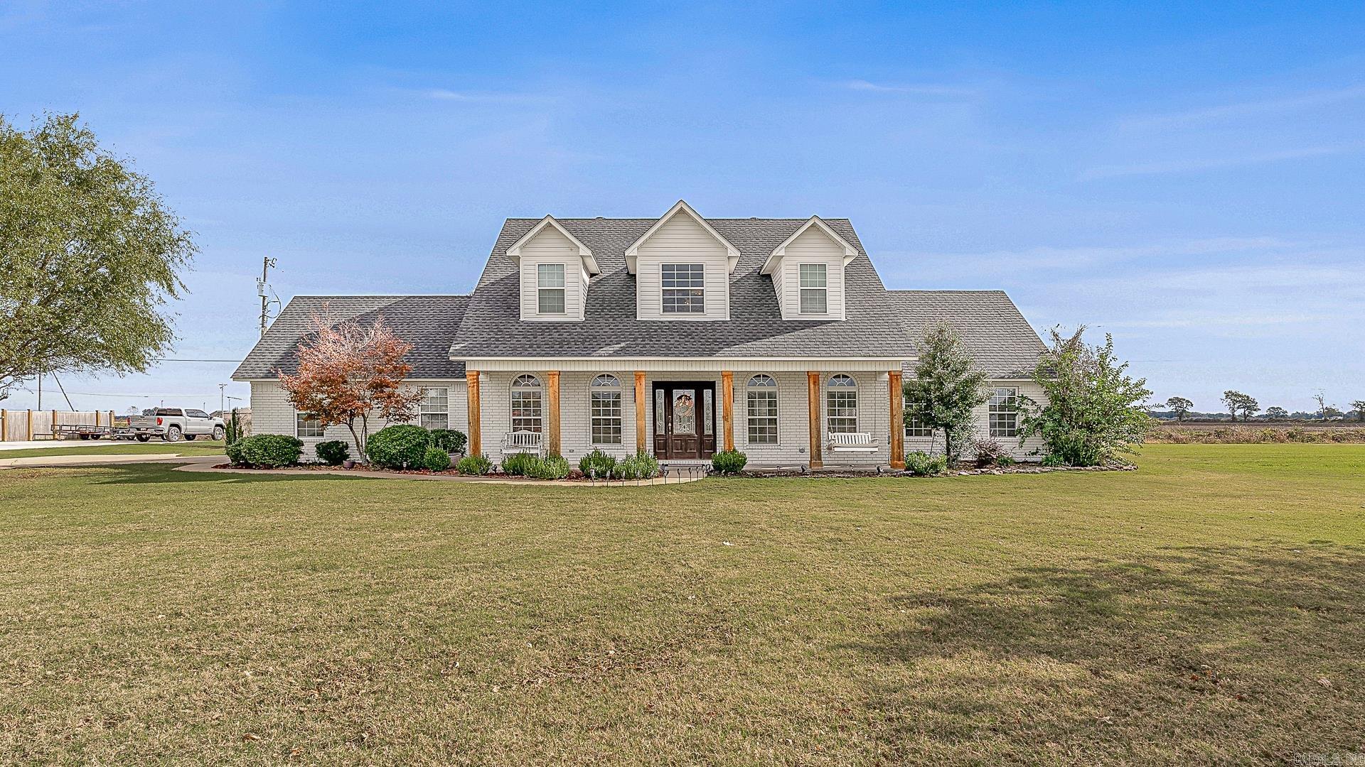 Welcome to Market: 102 Reinhart Ln of Manila, to Mississippi County, of the Manila Public School District. Find 6 recently updated cedar columns showcasing the front of this home that opens into a sitting room spilling into a full living room with an inviting gas log fireplace. The well laid out kitchen provides long counter tops and a bevy of accessible cabinets leading into the private dining room. You’ll also find the primary bedroom with an en-suite bathroom containing a double vanity and a jetted tub, a guest bathroom, and a laundry room. Upstairs provides an additional four bedrooms and yet another bathroom. Don’t miss the privacy-fenced backyard with patio and in-ground pool as well as the many renovations such as roof, garage door and opener, 2 AC units, updated trim, baseboards, and light fixtures, crown molding, painted exterior, pool pump, tornado shelter in the garage, and even the cedar columns. However, one of the best things about this property might just be its location. You are only 3 miles from the school, centrally located between the city of Jonesboro and the steel mills, and only about an hour drive to Memphis, TN. Call to schedule your viewing today!
