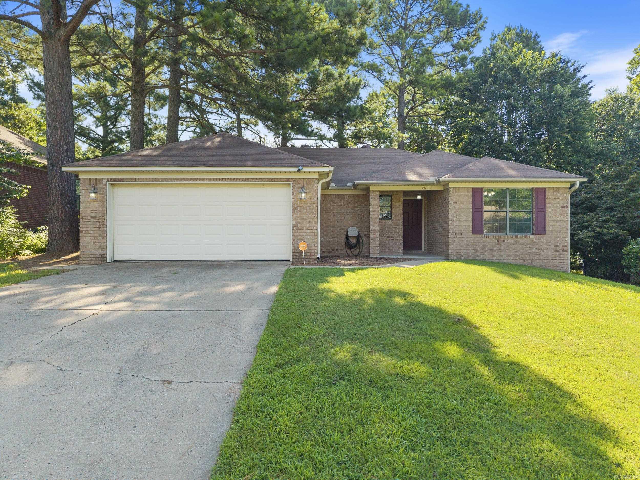 Great location very near the Salem road exit to I40. The yard is fully fenced with a separate fenced area for your dogs. Split plan with 2 guest bedrooms and bath separate from the primary bedroom. Refrigerator and washer and dryer to convey. New carpet. Laminate vinyl plank flooring in the living room is only 2 years old. HVAC 2021 New vanity in the guest bathroom.