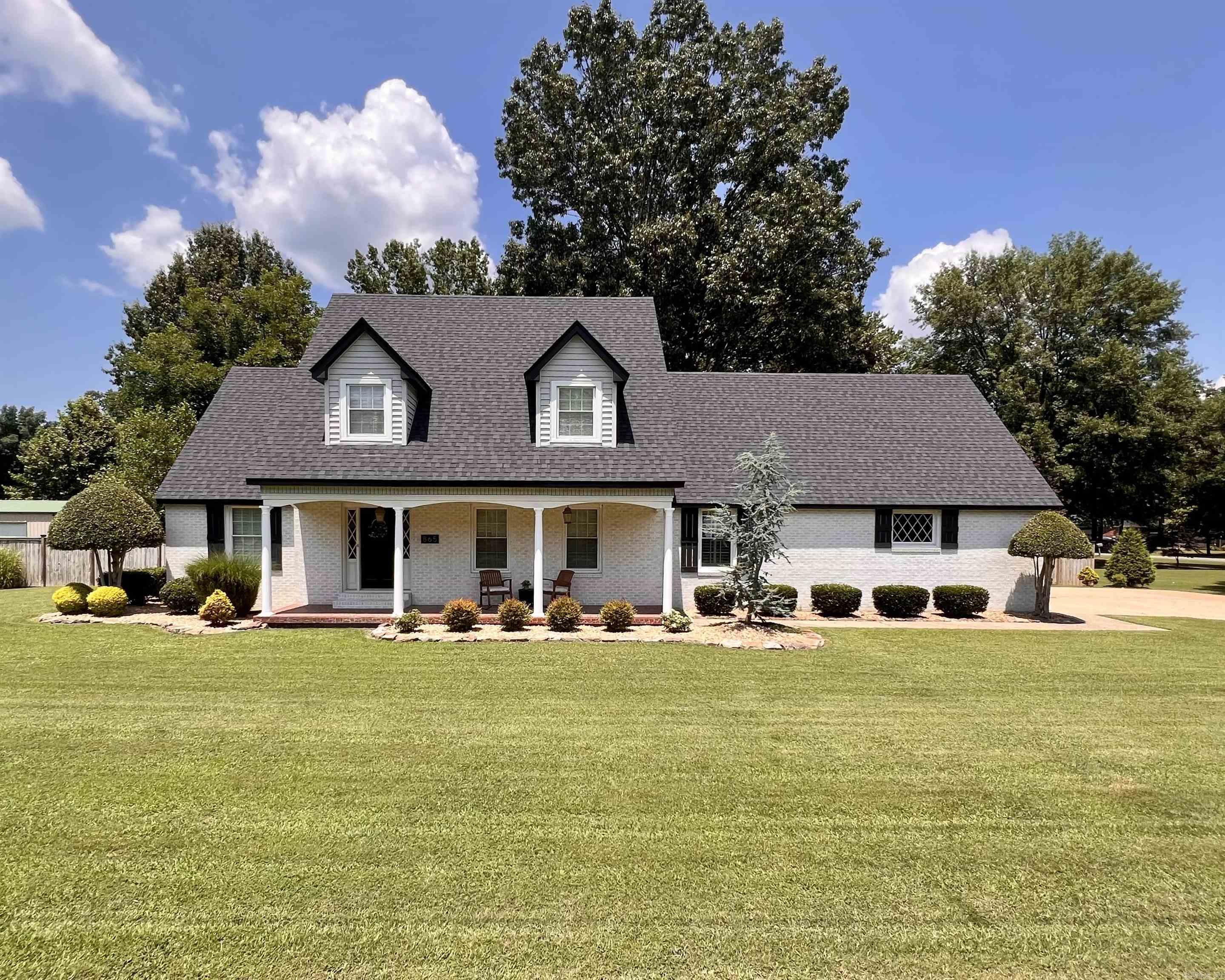 865 W. North St. Piggott, AR is the picture-perfect home that you've been looking for! This 4-BR, 2.5-BA newly remodeled 2,612-SQFT home sits on 0.80 acres! Nestled on a huge corner lot, with 200-year-old shade trees, a new privacy fence, a 12x16 lofted barn cabin in the back yard, and a stunning 15x36 covered patio make for perfect times to be spent with family and friends! A new roof along with new heat and air unit make this property even more desirable. The inside of this immaculate home has been updated and remodeled by one of the best designers around! The color schemes throughout the house are absolutely stunning! The interior of this property is second to none. This cozy home flows smoothly throughout the open floor plan. Large spacious rooms make this the perfect home to host those family gatherings. The charm of this property is absolutely a must see! This is your forever dream home!!