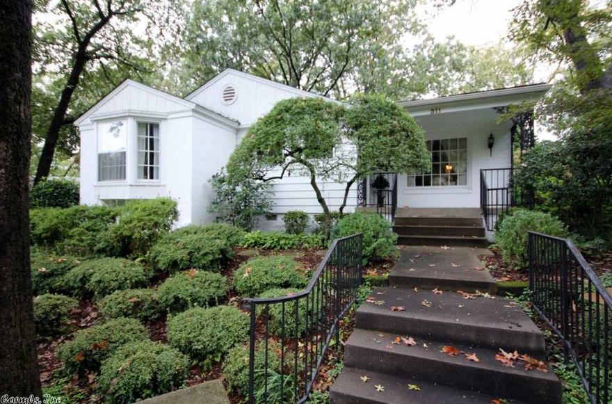 Precious 1-owner home that has been lovingly maintained since it was built in 1947. Hardwoods are under the carpeting. Wonderful den (garden room) looks out onto beautiful little yard. Automatic sprinkler system. 2-car carport. FP in LR strictly decorative. Stackable W/D & refrigerator convey. A truly charming home!