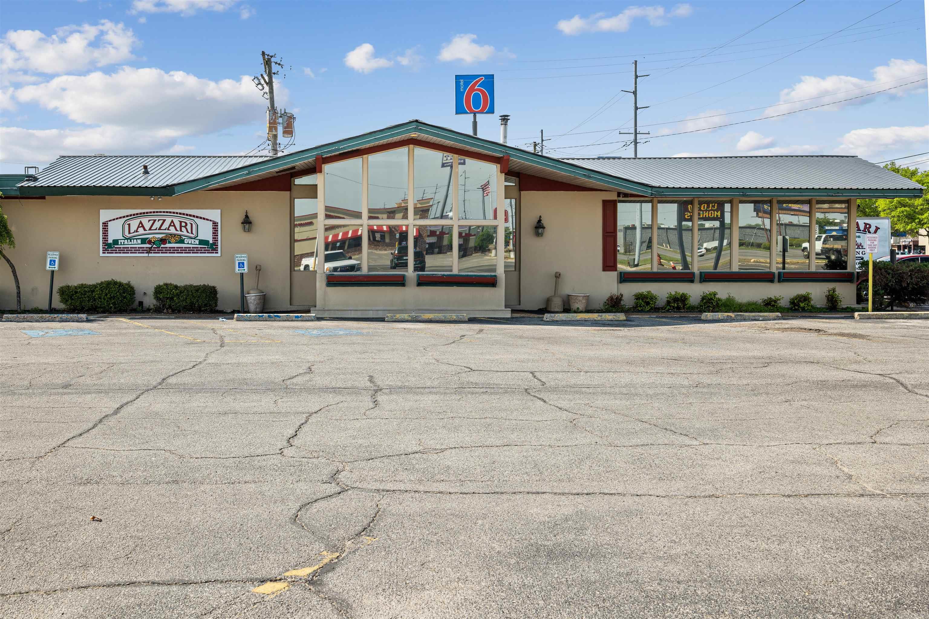 Presenting a premier investment or owner/operator opportunity in the heart of Jonesboroās thriving retail and dining corridor. Located at 2230 S. Caraway Road, this offering features a 6,661 square foot commercial food service facility situated on approximately 1.14 acres with approximately 200 feet of frontage and 250 feet of depth. The property is positioned in one of Jonesboroās most desirable commercial locations, offering exceptional visibility, high traffic counts, and strong surrounding demographics. The building is currently tenant-occupied by a longstanding and successful restaurant, Lazzariās Italian Oven; however, the offering is for real estate only and does not include the business. Site improvements include approximately 21,952 square feet of asphalt paving, 676 square feet of concrete pads, porches, and walkways, as well as sodium vapor security lighting, monument signage, and established landscaping. The interior layout includes an estimated seating capacity for approximately 200 patrons, based on the current setup of 50 tables with four-chair seating, along with a full-service bar area, reception and waiting area, commercial kitchen, restrooms, and office space.