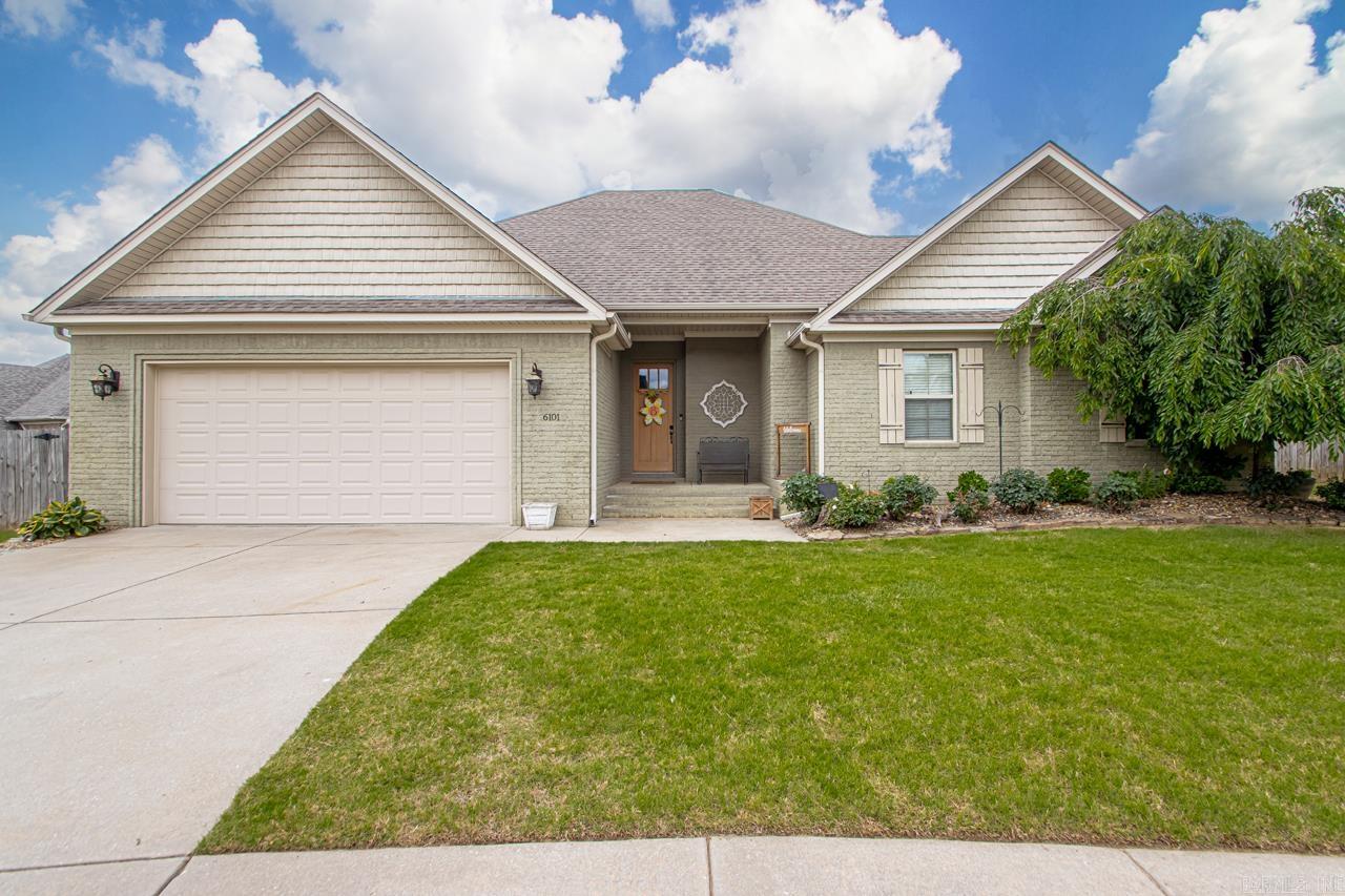 This beautiful 2161sq.ft. 4 bed, 2 bath home is nestled in the family friendly neighborhood of Remington Place-Bryant School District. This home welcomes you to a place of refuge with its cottage style aesthetics including its calming unique color of painted brick with cream board & batten shutters and a light oak craftsman style front door. It sits in a great little cul-de-sac - a perfect place for the kids to ride bikes and play basketball! The immaculate kitchen features dark stained cabinetry, amazing quartz countertops, stainless steel appliances, a large island with a bar to create easy conversation with the kids while they eat a snack and do their homework. The kitchen opens to the large living room featuring wall to wall built-in painted cabinetry surrounding the gas fireplace with large windows to let the sunshine in! The eat-in kitchen leads outside to the covered back porch and nicely fenced backyard – a perfect place to enjoy your morning cup of coffee. The peaceful master suite that includes double sinks and a large walk-in shower. You will love the large bonus room- perfect for movie nights! Let’s get you settled in your new home before school starts!