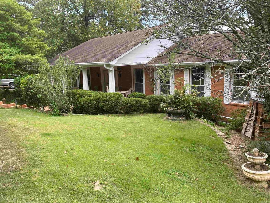 Lots of updates on this spacious 4 bedroom, 3 bath home located on a cul-de-sac.  Newly remodeled kitchen with quartz countertops and built in Sub Zero refrigerator and freezer drawers.  In 2021, the water heater was installed with hot water recycle circulation, basement encapsulation with dehumidifier, and gutter guards. Recently remodeled bathrooms with new fixtures and fresh paint throughout the home. Yard is fenced with sprinkler system and landscape lighting. The enormous brick front porch is very private framed with columns, and backyard patio is flanked with flower beds. The main level has a large master bedroom with private bath and deck, and guest bedroom. Laundry room with lots of cabinetry/pantry is off the kitchen.  Separate dining room and open living room. Downstairs has wet bar in the large TV/entertainment room with french doors to patio. Fireplace is in the family room with additional two spacious bedrooms. Unusually large closets throughout the house and safe areas for stormy weather. Don't forget that just a few blocks away is the Leawood pool and tennis courts for additional fun!