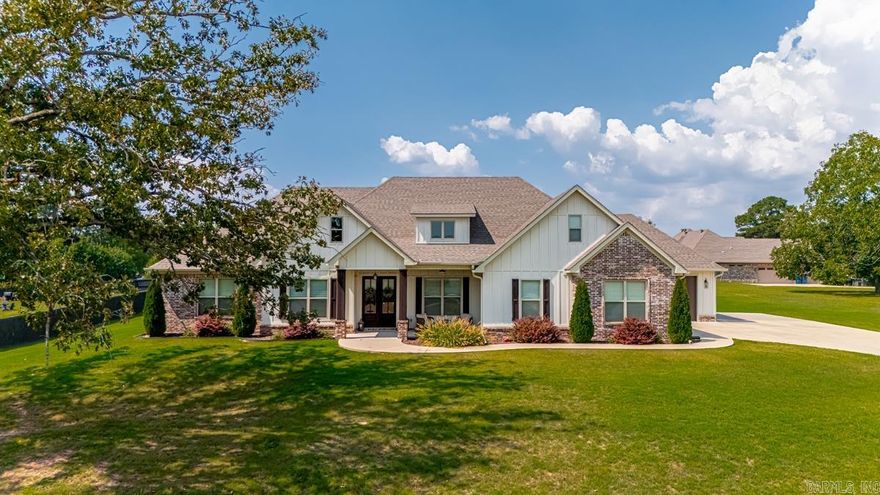 Boasting tons of curb appeal, this home sits on a one-acre lot in the Vineyards!  4 bedrooms and 2 1/2 baths all on one level!  Plus a huge bonus room upstairs (could be a 5th bedroom)! Beautiful brand new hardwoods throughout - no carpet! The great room features a wall of windows with custom shades, cathedral ceilings, a gas log fireplace, and custom built-ins on either side of the fireplace.  The eat-in kitchen is open to the great room and features a large island, gas stove, granite countertops and tons of cabinet space!  The formal dining room is perfect with plantation shutters and a tongue in groove stained ceiling!  The primary bedroom is apart from the other bedrooms and features a custom tiled shower and a soaker tub.  The laundry room and mud room area are conveniently located near the primary bedroom/and the two primary closets.  Outside, there is a large covered patio and tons of space!  Plenty of room for a future pool or shop! 3 Car Garage!!