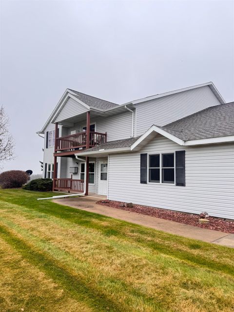 Photo of 210 COUNTRY SIDE Court #C, WAUPACA, WI 54981 (MLS # 50318671)