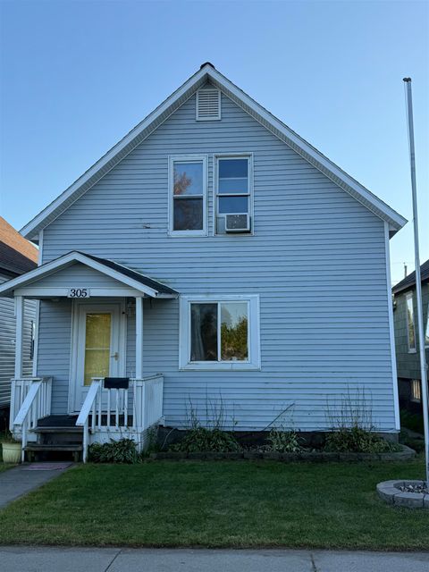 Photo of 305 CARNEY Boulevard, MARINETTE, WI 54143 (MLS # 50316223)