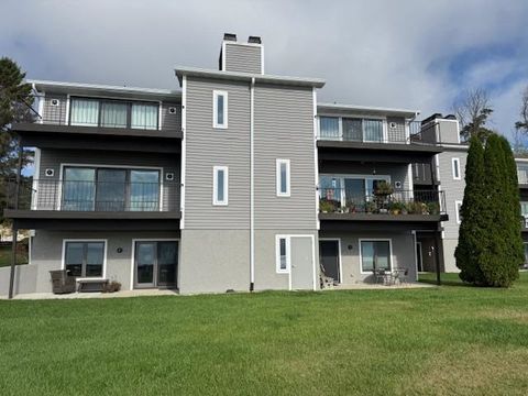Photo of 150 SUMMIT BEACH Drive, ALGOMA, WI 54201 (MLS # 50315661)