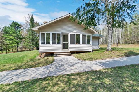 Photo of W14398 CAMP 5 Road, ATHELSTANE, WI 54104 (MLS # 50308407)