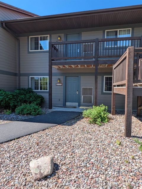 Photo of 2002 WILD EAGLE Lane #124, EAGLE RIVER, WI 54521 (MLS # 50327505)
