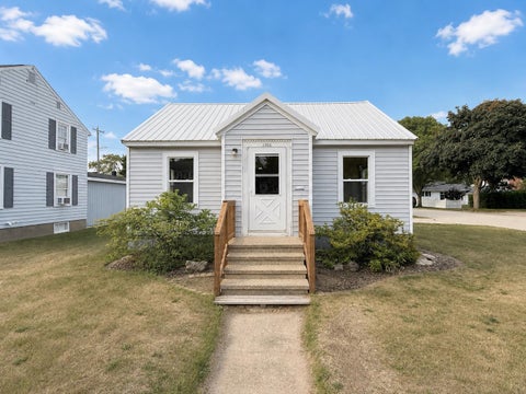 Photo of 1900 16TH Avenue, MENOMINEE, MI 49858 (MLS # 50330481)