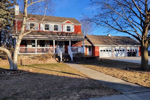 Photo of 304 S LAKE Street, HUSTISFORD, WI 53034 (MLS # 50321670)