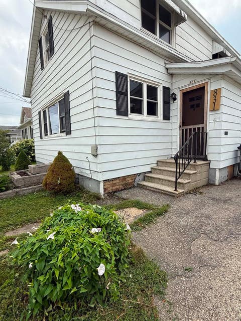 Photo of 831 WINNEBAG0 Avenue, OSHKOSH, WI 54901 (MLS # 50330661)