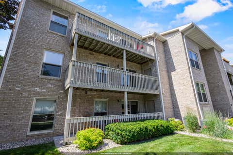 Photo of 1600 RUSTIC OAKS Court #11, GREEN BAY, WI 54301 (MLS # 50330200)