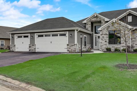 Photo of 7826 W Stone Ridge Dr, Lannon, WI 53046 (MLS # 1777208)