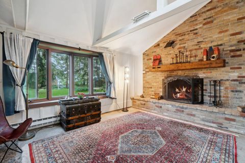 Photo of 4987 Lower Forest Beach Rd, Port Washington, WI 53074 (MLS # 1875548)