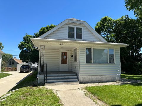 Photo of 1452 S 52nd St, West Milwaukee, WI 53214 (MLS # 1879746) Photo of 1452 S 52nd St, West Milwaukee, WI 53214 (MLS # 1879746)