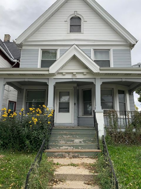 Photo of 2406 W Highland Ave, Milwaukee, WI 53233 (MLS # 1813917)